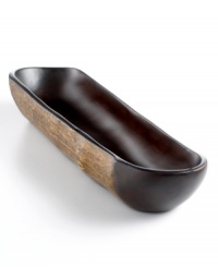 Hand-carved from a branch of the fast-growing obeche tree, this rustic boat bowl is an ode to the Haitian mountainside and designed by Haiti's master woodwork artist, Einstein Albert. A unique vessel for displaying cool objects, fake fruit or simply accenting the table. Hand-carved from a branch of the fast-growing obeche tree, this rustic boat bowl is an ode to the Haitian mountainside and designed by Haiti's master woodwork artist, Einstein Albert. A unique vessel for displaying cool objects, fake fruit or simply accenting the table.