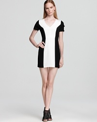 Make a bold statement in modern monochrome--the preferred palate of the season--with this party-perfect Rebecca Minkoff dress. Make a bold statement in modern monochrome--the preferred palate of the season--with this party-perfect Rebecca Minkoff dress.