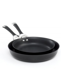Get a handle on heat with the superior performance of Circulon's hard-anodized construction, which provides even heating for brilliant results. The Total® Food Release System and signature dishwasher-safe nonstick finish get food off the pan and onto plates effortlessly. Lifetime warranty. Get a handle on heat with the superior performance of Circulon's hard-anodized construction, which provides even heating for brilliant results. The Total® Food Release System and signature dishwasher-safe nonstick finish get food off the pan and onto plates effortlessly. Lifetime warranty.