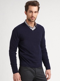 More than the ordinary pullover sweater, this v-neck knit is made from a stylish combination of cotton and cashmere.V-neckLong sleevesPullover70% cotton/30% cashmereDry cleanImported More than the ordinary pullover sweater, this v-neck knit is made from a stylish combination of cotton and cashmere.V-neckLong sleevesPullover70% cotton/30% cashmereDry cleanImported