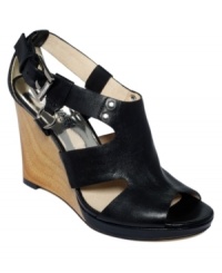 The cuteness is in the cutouts. MICHAEL Michael Kors' Briyette platform wedges are structured, yet still completely lady-like. The cuteness is in the cutouts. MICHAEL Michael Kors' Briyette platform wedges are structured, yet still completely lady-like.