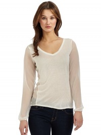 THE LOOKPullover styleV-neckLong sheer elastic cuff sleevesSheer side panelsTHE FITAbout 24 from shoulder to hemTHE MATERIALHammered silk charmeuseCARE & ORIGINDry cleanMade in USAModel shown is 5'9½ (176cm) wearing US size Small. THE LOOKPullover styleV-neckLong sheer elastic cuff sleevesSheer side panelsTHE FITAbout 24 from shoulder to hemTHE MATERIALHammered silk charmeuseCARE & ORIGINDry cleanMade in USAModel shown is 5'9½ (176cm) wearing US size Small.
