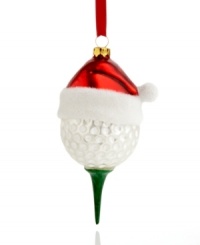 Christmas to a tee. Make your favorite golfer very merry with this molded glass golf ball ornament, topped in a red Santa hat. Christmas to a tee. Make your favorite golfer very merry with this molded glass golf ball ornament, topped in a red Santa hat.