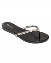 GUESS gives the humble thong sandal an elegant touch with can't-miss rhinestone embellishment. GUESS gives the humble thong sandal an elegant touch with can't-miss rhinestone embellishment.