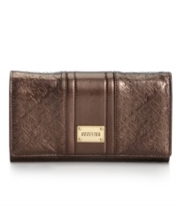 Get yourself instantly organized with this signature-embossed Kenneth Cole Reaction wallet that discretely slips into your handbag and safely stows cash, coins, cards and ID, along with a few other extra essentials.