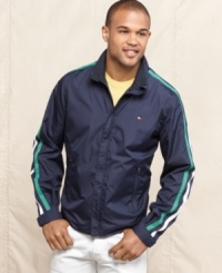 Improve your look off the tee with this striped golf windbreaker from Tommy Hilfiger. Improve your look off the tee with this striped golf windbreaker from Tommy Hilfiger.