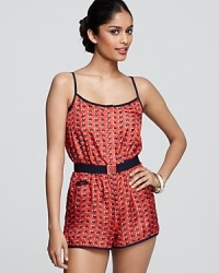 Send hearts aflutter in this MARC BY MARC JACOBS printed silk romper, bedecked in lovable hearts on a playful silhouette. Send hearts aflutter in this MARC BY MARC JACOBS printed silk romper, bedecked in lovable hearts on a playful silhouette.