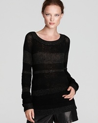 Hand knit with Edun's signature urban edge, this mixed yarn sweater masters that elusive yet effortlessly cool slouchy silhouette. Hand knit with Edun's signature urban edge, this mixed yarn sweater masters that elusive yet effortlessly cool slouchy silhouette.