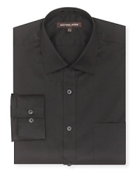Long sleeve, non-iron solid shirt. A regular fitting, button front dress shirt with spread collar and adjustable barrel cuffs. Chest pocket at left chest. Long sleeve, non-iron solid shirt. A regular fitting, button front dress shirt with spread collar and adjustable barrel cuffs. Chest pocket at left chest.