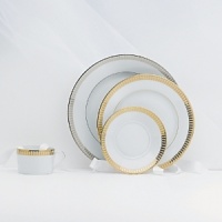 A symphony of elegance that harmonizes beautifully with virtually every decor or color scheme. Gold rim. A symphony of elegance that harmonizes beautifully with virtually every decor or color scheme. Gold rim.