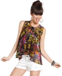 A burst of blazing colors makes this sheer, asymmetrical blouse from Material Girl a killer choice for every day style! A burst of blazing colors makes this sheer, asymmetrical blouse from Material Girl a killer choice for every day style!
