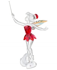 Disney's Tinker Bell takes a page from Mrs. Claus' book, dressed in a sparkling red dress and hat with platinum-white trim. Shimmering wings and a silver-tone metal wand topped with Swarovski crystal adds to the special holiday collectible. Disney's Tinker Bell takes a page from Mrs. Claus' book, dressed in a sparkling red dress and hat with platinum-white trim. Shimmering wings and a silver-tone metal wand topped with Swarovski crystal adds to the special holiday collectible.