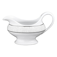 An icon of grand rich tradition of excellence, Bernardaud embodies one of the most innovative spirits among French luxury houses today. A trendsetter in design, it's porcelain collections are characterized by original forms, capturing the essence of their time. Inspired by distant deserts and drawn from timeless landscapes, Dune still bears the caress of the wind on the sand on its wide borders. With its pearly reflection and its subtle texture, the Limoges porcelain vibrates with a soft light. Based in white, classic, yet modern, Dune will forever dress your table with style. An icon of grand rich tradition of excellence, Bernardaud embodies one of the most innovative spirits among French luxury houses today. A trendsetter in design, it's porcelain collections are characterized by original forms, capturing the essence of their time. Inspired by distant deserts and drawn from timeless landscapes, Dune still bears the caress of the wind on the sand on its wide borders. With its pearly reflection and its subtle texture, the Limoges porcelain vibrates with a soft light. Based in white, classic, yet modern, Dune will forever dress your table with style.