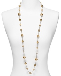Finish your look with this chic beaded necklace from Carolee.