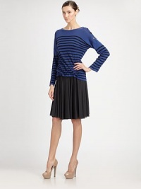 Sporty horizontal stripes band the body of this soft cotton silhouette.Jewel necklineDropped shoulder with button closuresLong sleeves Signature back loopCottonDry cleanMade in ItalyModel size is 5'11 (180cm) wearing US size Small. Sporty horizontal stripes band the body of this soft cotton silhouette.Jewel necklineDropped shoulder with button closuresLong sleeves Signature back loopCottonDry cleanMade in ItalyModel size is 5'11 (180cm) wearing US size Small.