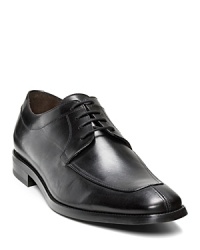 Timeless and handsome. Perfect for practically any occasion. Leather lace-up, split toe apron oxfords shoe. Rubber sole with dotted treading. Slight stacked heel. Timeless and handsome. Perfect for practically any occasion. Leather lace-up, split toe apron oxfords shoe. Rubber sole with dotted treading. Slight stacked heel.