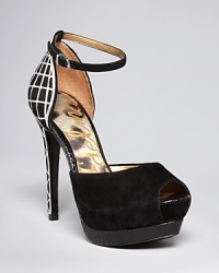 A caged metal heel lends modern edge to Sam Edelman's Paulette platforms, crafted in sumptuous suede. A caged metal heel lends modern edge to Sam Edelman's Paulette platforms, crafted in sumptuous suede.