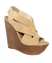 These shoes were made for strutting. Intricate crisscross straps and a chunky platform heel make the Banndo wedges from STEVEN by Steve Madden a style worth noticing. These shoes were made for strutting. Intricate crisscross straps and a chunky platform heel make the Banndo wedges from STEVEN by Steve Madden a style worth noticing.