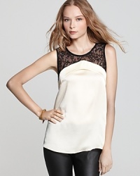 This chic PJK Patterson J. Kincaid tank offers an edgier take on black-tie style featuring contrast black lace accents fused with a flowing ivory bodice--it's the one that plays well with others for mix-and-match perfection. This chic PJK Patterson J. Kincaid tank offers an edgier take on black-tie style featuring contrast black lace accents fused with a flowing ivory bodice--it's the one that plays well with others for mix-and-match perfection.