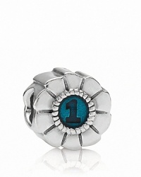 This winning PANDORA charm depicts a sterling silver ribbon with colored enamel center. This winning PANDORA charm depicts a sterling silver ribbon with colored enamel center.