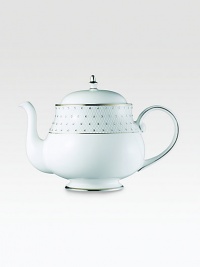 From the Princess Collection. Fine bone china, elegantly shaped, rimmed in platinum, with a lattice border sprinkled with Swarovski ELEMENTS crystals...lovely enough to serve tea to royalty.Bone chinaPlatinum platingCrystalsAbout 10.25H X 11W X 6D Hand washImported From the Princess Collection. Fine bone china, elegantly shaped, rimmed in platinum, with a lattice border sprinkled with Swarovski ELEMENTS crystals...lovely enough to serve tea to royalty.Bone chinaPlatinum platingCrystalsAbout 10.25H X 11W X 6D Hand washImported
