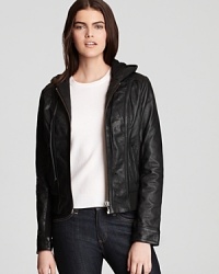 This chic leather and shearling KORS Michael Kors jacket is the perfect city coat with cozy ribbed knit trim at the hem and sleeves for an extra dose of warmth. This chic leather and shearling KORS Michael Kors jacket is the perfect city coat with cozy ribbed knit trim at the hem and sleeves for an extra dose of warmth.