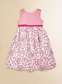 A pretty frock with a satiny bodice, a splashy floral print skirt and a velvet ribbon and bow in between the two.Round necklineSleevelessSolid bodiceEmpire waistFull print skirtBack zip closeFully linedCottonDry cleanImported A pretty frock with a satiny bodice, a splashy floral print skirt and a velvet ribbon and bow in between the two.Round necklineSleevelessSolid bodiceEmpire waistFull print skirtBack zip closeFully linedCottonDry cleanImported