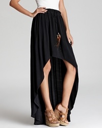 Feather-adorned waist ties lend bohemian spirit to this Patterson J. Kincaid maxi skirt, cut in a dramatic high/low silhouette. Feather-adorned waist ties lend bohemian spirit to this Patterson J. Kincaid maxi skirt, cut in a dramatic high/low silhouette.