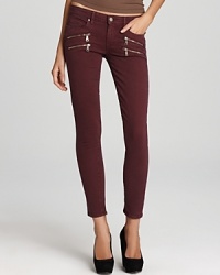 Front exposed zips lend a punk-chic sensibility to these Paige Denim skinny jeans. Front exposed zips lend a punk-chic sensibility to these Paige Denim skinny jeans.