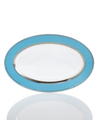 Get away from ordinary dining with dreamy Lauderdale dinnerware by Cru. Shimmering platinum dots and bands contrast swaths of sea blue on this fuss-free, dishwasher-safe oval platter inspired by a favorite Floridian retreat. Get away from ordinary dining with dreamy Lauderdale dinnerware by Cru. Shimmering platinum dots and bands contrast swaths of sea blue on this fuss-free, dishwasher-safe oval platter inspired by a favorite Floridian retreat.