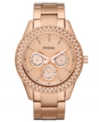 This Stella collection watch from Fossil dolls up the classic chronograph with rosy hues and glistening crystals. This Stella collection watch from Fossil dolls up the classic chronograph with rosy hues and glistening crystals.