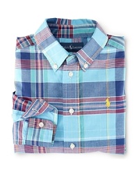 A button-down shirt in crisp woven cotton is perfectly preppy in bold-hued madras. A button-down shirt in crisp woven cotton is perfectly preppy in bold-hued madras.