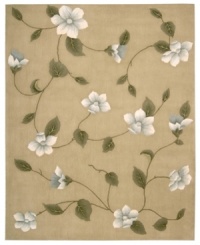Floral appeal. Gracefully designed with delicate blossoms against a light gold ground, this area rug is hand tufted and hand carved from only the finest premium wool, then expertly washed to lend the surface a handsome luster, texture and sheen. Floral appeal. Gracefully designed with delicate blossoms against a light gold ground, this area rug is hand tufted and hand carved from only the finest premium wool, then expertly washed to lend the surface a handsome luster, texture and sheen.