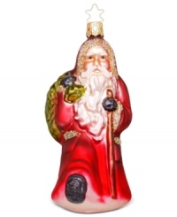 Equipped with his walking stick and heavy boots, this Inge-Glas Santa is ready for a long journey! Mouth-blown and hand-painted, this ornament shines bright every year. Equipped with his walking stick and heavy boots, this Inge-Glas Santa is ready for a long journey! Mouth-blown and hand-painted, this ornament shines bright every year.