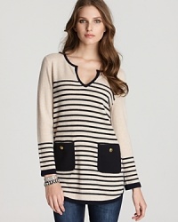 With kitschy patch pockets and crisp nautical stripes, this Tory Burch tunic makes a major style splash. Anchor in the trend with classic denim and lofty espadrilles. With kitschy patch pockets and crisp nautical stripes, this Tory Burch tunic makes a major style splash. Anchor in the trend with classic denim and lofty espadrilles.