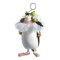 Mini Millicent Penguin by Patience Brewster arrives in her ballet ensemble bearing stars for her holiday performance. Mini Millicent Penguin by Patience Brewster arrives in her ballet ensemble bearing stars for her holiday performance.