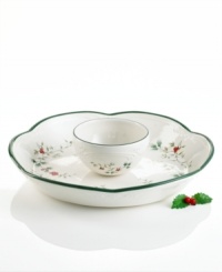 Dip into elegant holiday entertaining with this beautiful chip and dip pairing from Pfaltzgraff's holiday collection of dinnerware and dishes. Vibrant holly berries and leaves dance across these stoneware pieces with decorative green detail rims. Dip into elegant holiday entertaining with this beautiful chip and dip pairing from Pfaltzgraff's holiday collection of dinnerware and dishes. Vibrant holly berries and leaves dance across these stoneware pieces with decorative green detail rims.