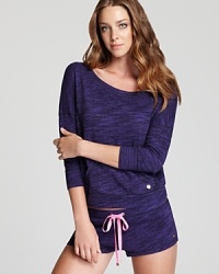 Sporty yet chic, Juicy Couture's dolman-sleeve pullover will become your new go-to for lounging around. Sporty yet chic, Juicy Couture's dolman-sleeve pullover will become your new go-to for lounging around.
