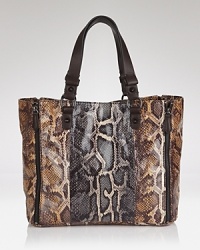 Show a little skin - in the most exotic, sort of way with this tote from Sam Edelman. Perfectly sized and boldly printed, it's an effortless outfit pick up. Show a little skin - in the most exotic, sort of way with this tote from Sam Edelman. Perfectly sized and boldly printed, it's an effortless outfit pick up.