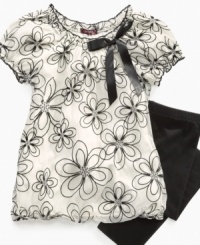Sparkly flowers and a bubble shape make this cute Tempted tunic and leggings set totally groovy. Sparkly flowers and a bubble shape make this cute Tempted tunic and leggings set totally groovy.