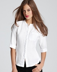 James Perse updates the classic button-up with a collarless silhouette and ribbed insets. James Perse updates the classic button-up with a collarless silhouette and ribbed insets.