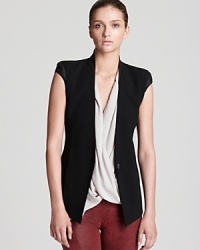 The perfect finishing piece, this Helmut Lang vest adds a dose of cool to your fall wardrobe. Trend-forward and truly unique, this ultra-soft style boasts supple leather trim, an angled hem, zip pockets and a back vent. The perfect finishing piece, this Helmut Lang vest adds a dose of cool to your fall wardrobe. Trend-forward and truly unique, this ultra-soft style boasts supple leather trim, an angled hem, zip pockets and a back vent.