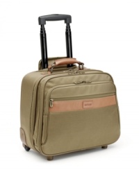 A sleek design and strong build let you travel with confidence. Tote your toiletries, phones and important papers in a piece constructed of lightweight, durable ballistic nylon. Features tough, full-grain leather trim and a finish in antique brass or matte black nickel hardware. Stores in overhead compartments for convenience. A sleek design and strong build let you travel with confidence. Tote your toiletries, phones and important papers in a piece constructed of lightweight, durable ballistic nylon. Features tough, full-grain leather trim and a finish in antique brass or matte black nickel hardware. Stores in overhead compartments for convenience.