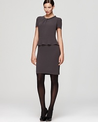 A fluttering peplum lends poetic dimension to a structured Gerard Darel sheath dress. Accentuate the sculptural silhouette with sheer black tights. A fluttering peplum lends poetic dimension to a structured Gerard Darel sheath dress. Accentuate the sculptural silhouette with sheer black tights.