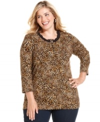 Capture the classic elegance of safari styling with Jones New York Signature's plus size henley top, featuring a leopard print. Capture the classic elegance of safari styling with Jones New York Signature's plus size henley top, featuring a leopard print.