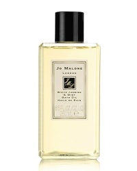 This enchanting essence, inspired by a sun-drenched morning in an English country garden, perfectly captures the scent of jasmine, lily, orange flower and rose on the morning breeze. An unexpected twist of soft and sensual wild mint stimulates the senses and teases the palette in this elegant and eccentric fragrance. White Jasmine & Mint Bath Oil gently fragrances and moisturizes the skin. Lush and softly foaming, it's pure relaxation. This enchanting essence, inspired by a sun-drenched morning in an English country garden, perfectly captures the scent of jasmine, lily, orange flower and rose on the morning breeze. An unexpected twist of soft and sensual wild mint stimulates the senses and teases the palette in this elegant and eccentric fragrance. White Jasmine & Mint Bath Oil gently fragrances and moisturizes the skin. Lush and softly foaming, it's pure relaxation.