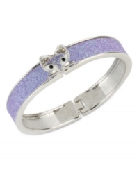 Slink into something new. This hinged bangle bracelet from Betsey Johnson is crafted from silver-tone mixed metal with purple glitter details and glass crystal accents to enhance the animal attraction.Approximate diameter: 2-1/4 inches.