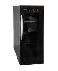 Raise a glass to convenience. Built for your countertop, this compact wine cellar ushers ease into your kitchen, storing and chilling four of your favorite reds and whites for a toast when you need it most. Ultra quiet with three full-width chrome storage racks, soft interior lighting and a small footprint for precision cooling and superior taste. 1-year warranty. Model HVTM04ABB. Raise a glass to convenience. Built for your countertop, this compact wine cellar ushers ease into your kitchen, storing and chilling four of your favorite reds and whites for a toast when you need it most. Ultra quiet with three full-width chrome storage racks, soft interior lighting and a small footprint for precision cooling and superior taste. 1-year warranty. Model HVTM04ABB.