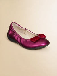 She'll be as darling as Dorothy in these gorgeous slippers with bright hues and a velvet bow.Slip-on style with elasticized topSynthetic leather upper with velvet bowLeather liningRubber soleLeather insoleImported She'll be as darling as Dorothy in these gorgeous slippers with bright hues and a velvet bow.Slip-on style with elasticized topSynthetic leather upper with velvet bowLeather liningRubber soleLeather insoleImported