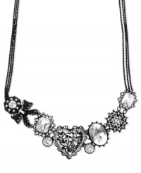 Show that your heart is in the right place with this frontal necklace from Betsey Johnson. Crafted from black-plated mixed metal, the necklace glistens with glass crystal accents. Approximate length: 16 inches + 3-inch extender. Approximate drop: 1-3/4 inches. Show that your heart is in the right place with this frontal necklace from Betsey Johnson. Crafted from black-plated mixed metal, the necklace glistens with glass crystal accents. Approximate length: 16 inches + 3-inch extender. Approximate drop: 1-3/4 inches.